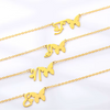 Collier papillon+lettre de l’alphabet